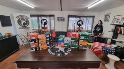 DONATION CHAUSSURES AVEC LA PARTICIPATION DU ROTARY CLUB DE LAMORLAYE